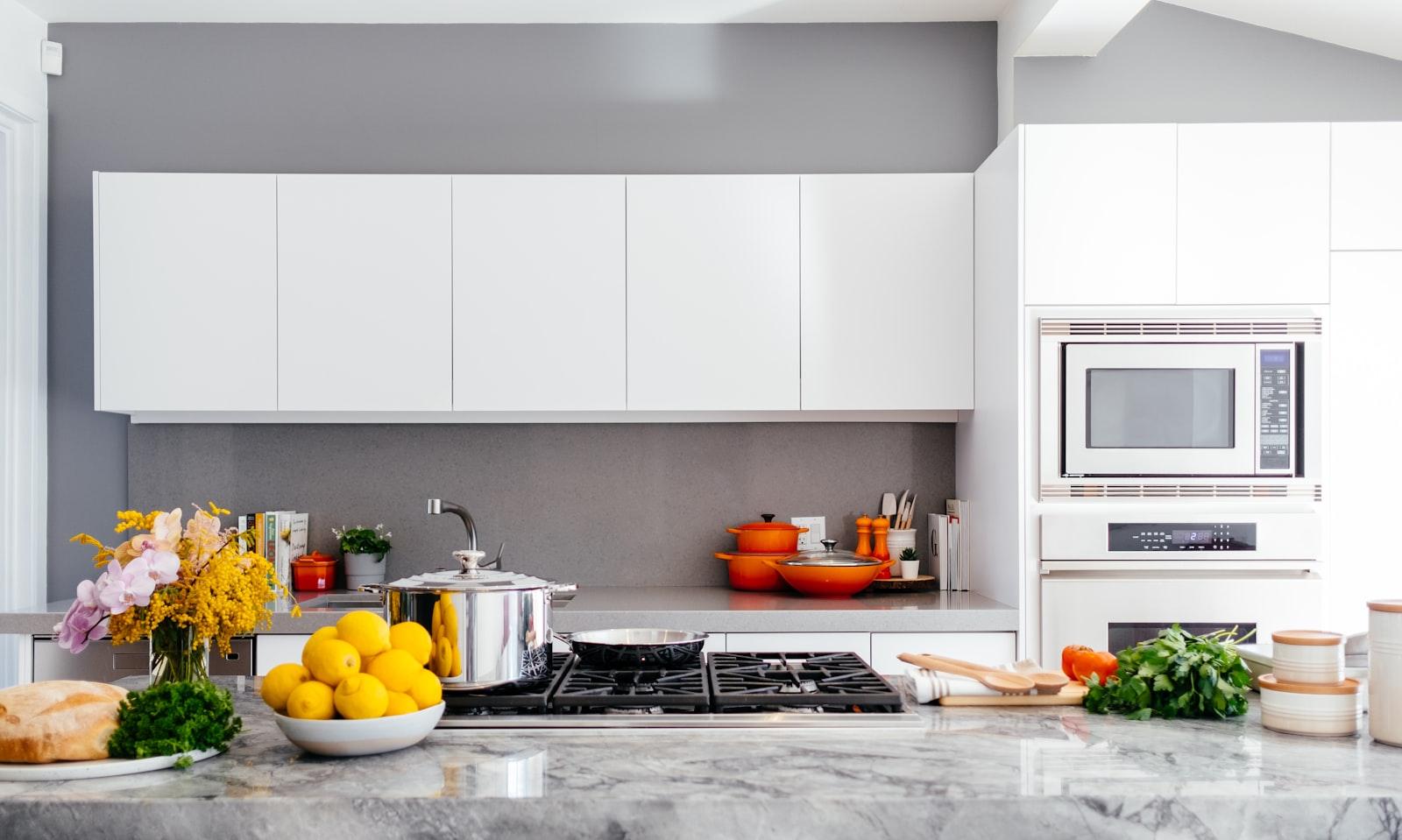 White modular kitchen cabinets and worktop
